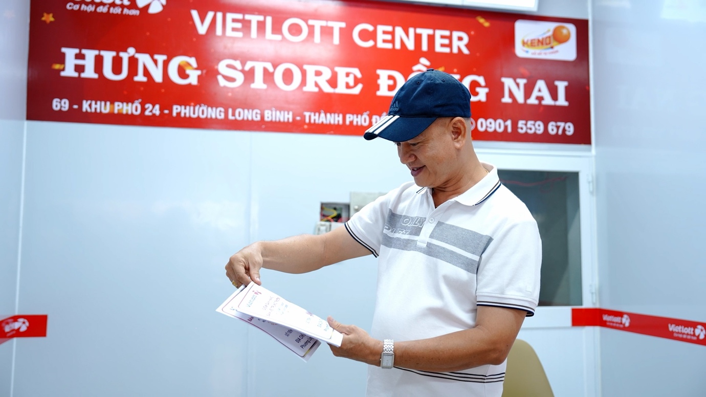 Chủ cửa hàng máy móc xây dựng bén duyên cùng Vietlott - 3