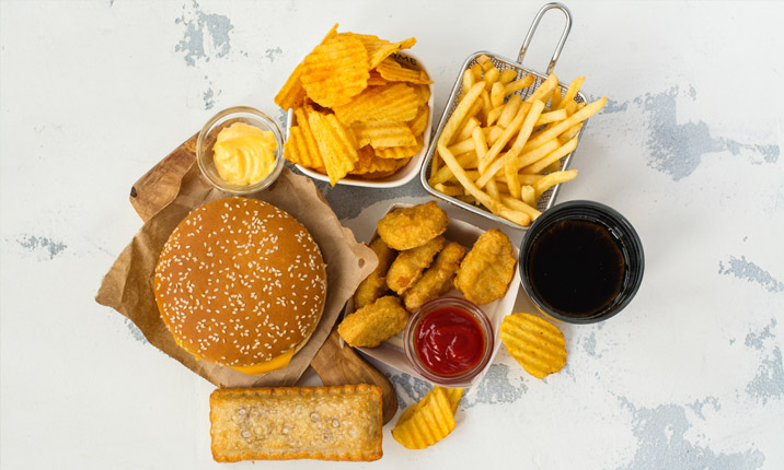 4 loại thực phẩm là "kẻ thù" của eo thon - 1