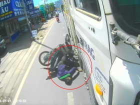 Clip: Hết hồn người đàn ông lao thẳng vào gầm xe tải đang chạy