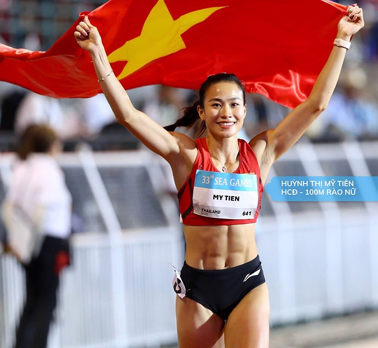 Hot girl điền kinh Mỹ Tiên bật mí bí quyết giữ cơ bụng 6 múi ngày Tết - 1