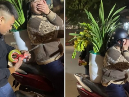 Giao thông - Clip: Cười nghiêng ngả cảnh buộc hoa ngày Tết có 1-0-2