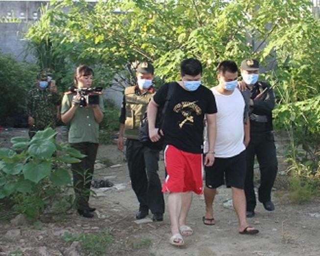 Vây bắt 21 người Trung Quốc trốn truy nã tại Lào Cai - 1