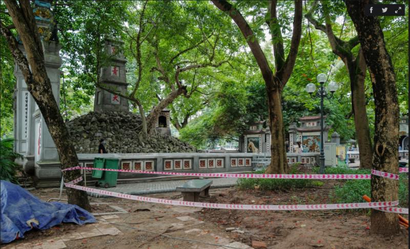 Công nhân gấp rút lát đá vỉa hè quanh Hồ Gươm - 1