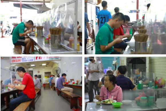 Hà Nội trong ngày đầu tiên giãn cách hàng quán: Bàn lắp vách ngăn, khách ngồi cách nhau 1 mét - 10