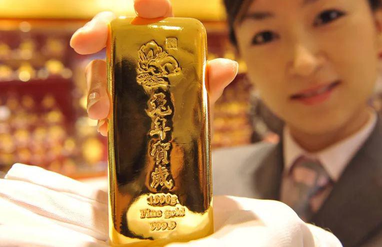 Trung Quốc kích hoạt làn sóng mua vàng, phiên giao dịch đêm sôi động - 1