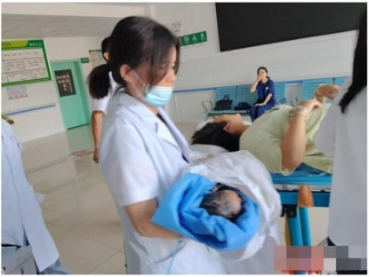 Gia đình - Đau bụng sau bữa trưa, cô gái vào viện và đẻ luôn 1 bé trai, trước đó không hề biết mình mang bầu