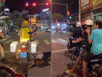 Giao thông - Clip: Người đàn ông không đội mũ bảo hiểm và pha chờ đèn đỏ “rén ngang”