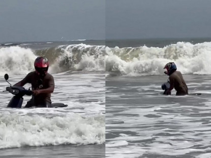 Giao thông - Clip: Thanh niên chạy xe điện lao thẳng xuống biển để... &quot;test xe&quot;