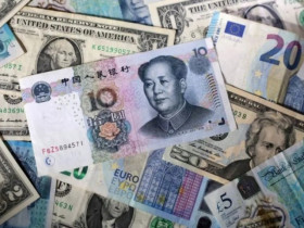 Đồng USD chạm đỉnh hai tuần khi thị trường chờ tín hiệu từ Fed và Mỹ - Trung