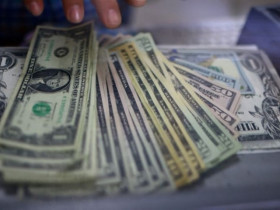Đồng USD giảm giá khi hy vọng chính phủ Mỹ sắp mở cửa trở lại