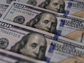 Đồng USD hạ nhiệt trước thềm quyết định lãi suất của Fed