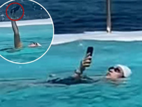 Cô gái gây bão vì sống ảo đến mức dùng điện thoại khi bơi